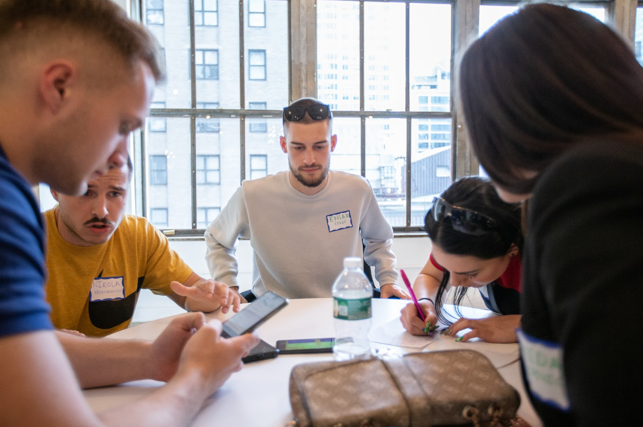 Bold Fellows working on a team project